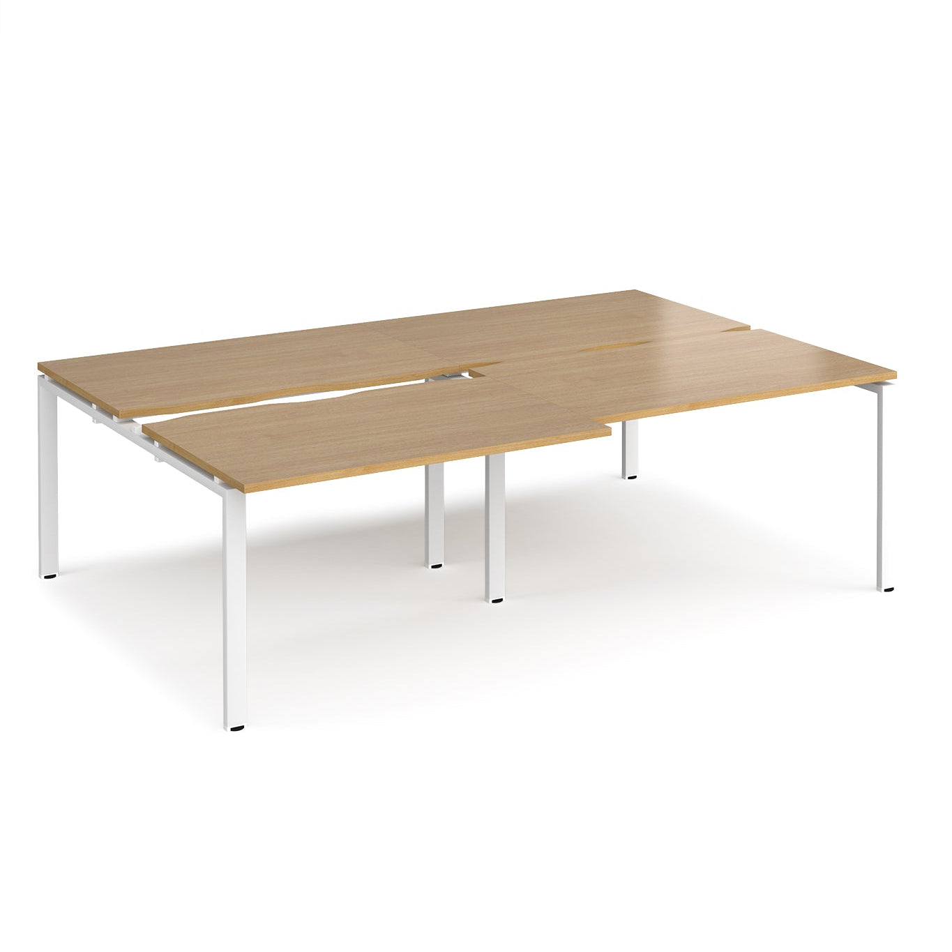 Large modular bench desk with a light oak wood-effect top, integrated cable access cut-outs, and white metal legs, shown on a white background.