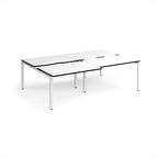Large modular bench desk with a white worktop, contrasting black edge detail, integrated cable access cut-outs, and white metal legs, shown on a white background.