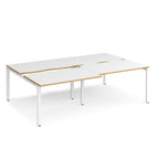 Large modular bench desk with white panels and wood-effect edging, integrated cable access cut-outs, and white metal legs, shown on a white background.