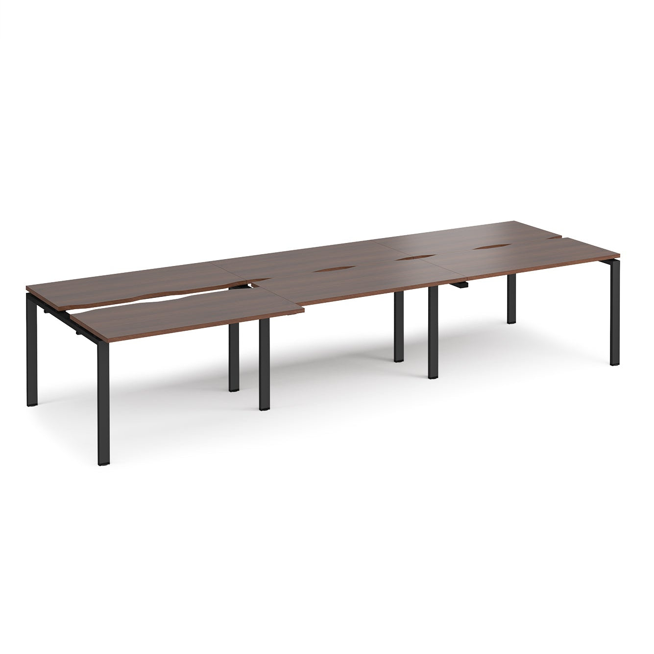 Large modular bench desk with dark wood-effect panels, integrated cable cut-outs, and black metal legs, shown on a white background.
