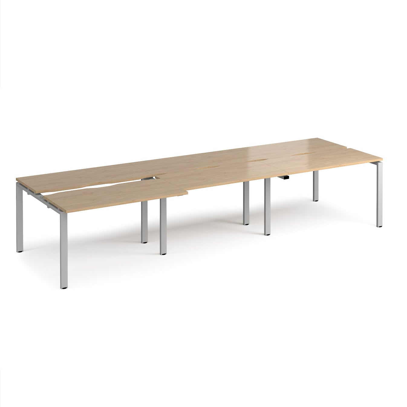 Large modular bench desk with a light oak wood-effect top, integrated cable access cut-outs, and silver metal legs, shown on a white background.