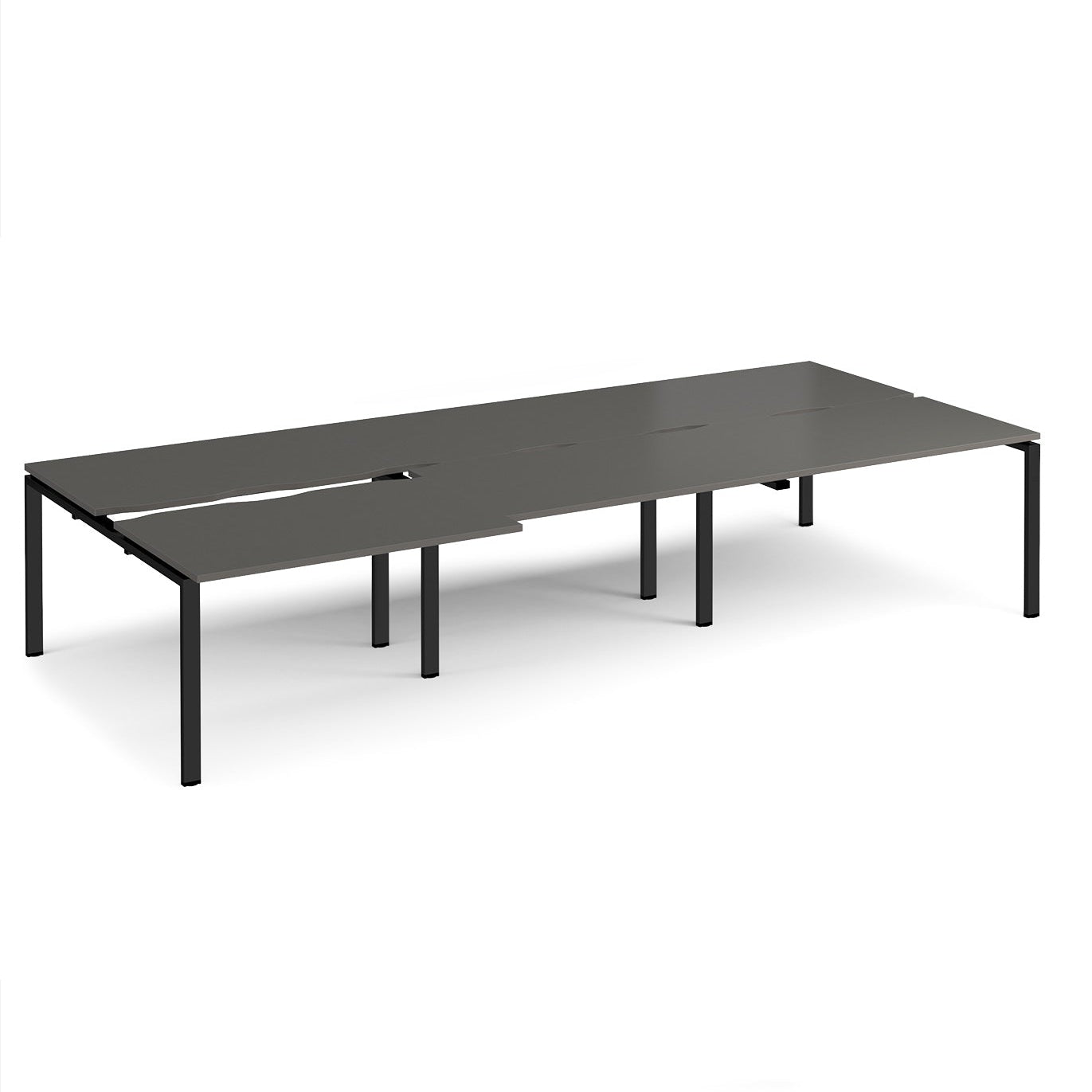 Large modular bench desk with a dark grey worktop, integrated cable access cut-outs, and black metal legs, shown on a white background.