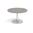 Round table with grey wood-effect top and metal base on a white background