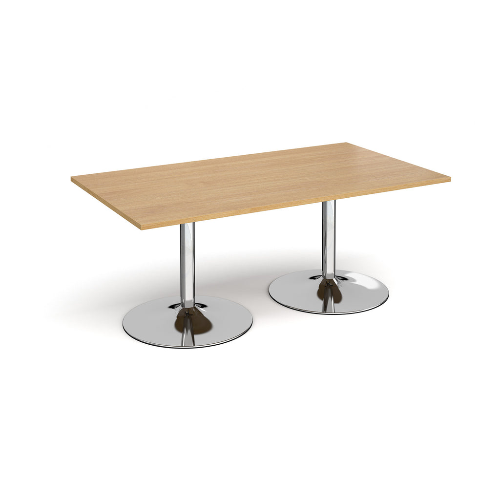 Rectangular table with wood-effect top and chrome base on a white background