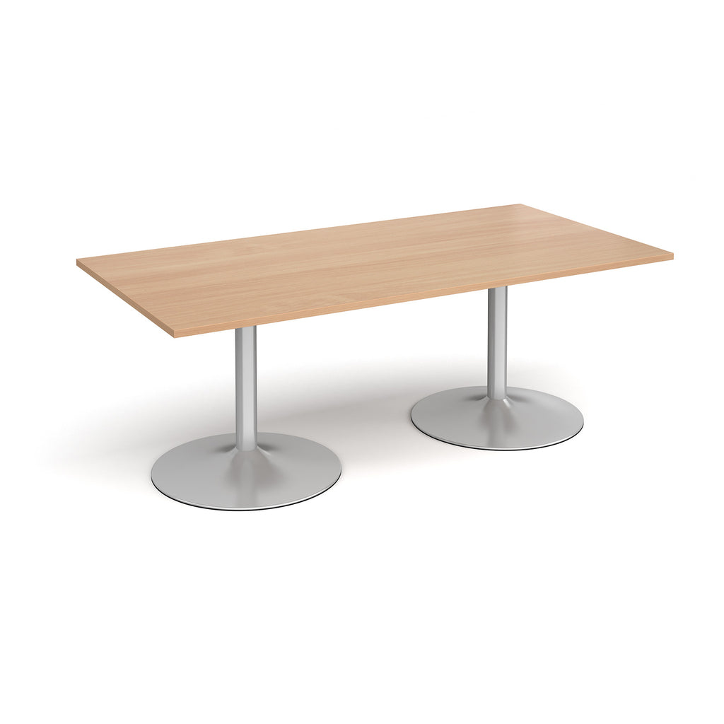 Rectangular table with wood-effect top and metal legs on a white background