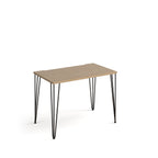 Rectangular office desk with an oak tabletop and slim black metal hairpin legs, shown on a white background.