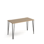Rectangular office desk with an oak tabletop and slim black metal hairpin legs, shown on a white background.