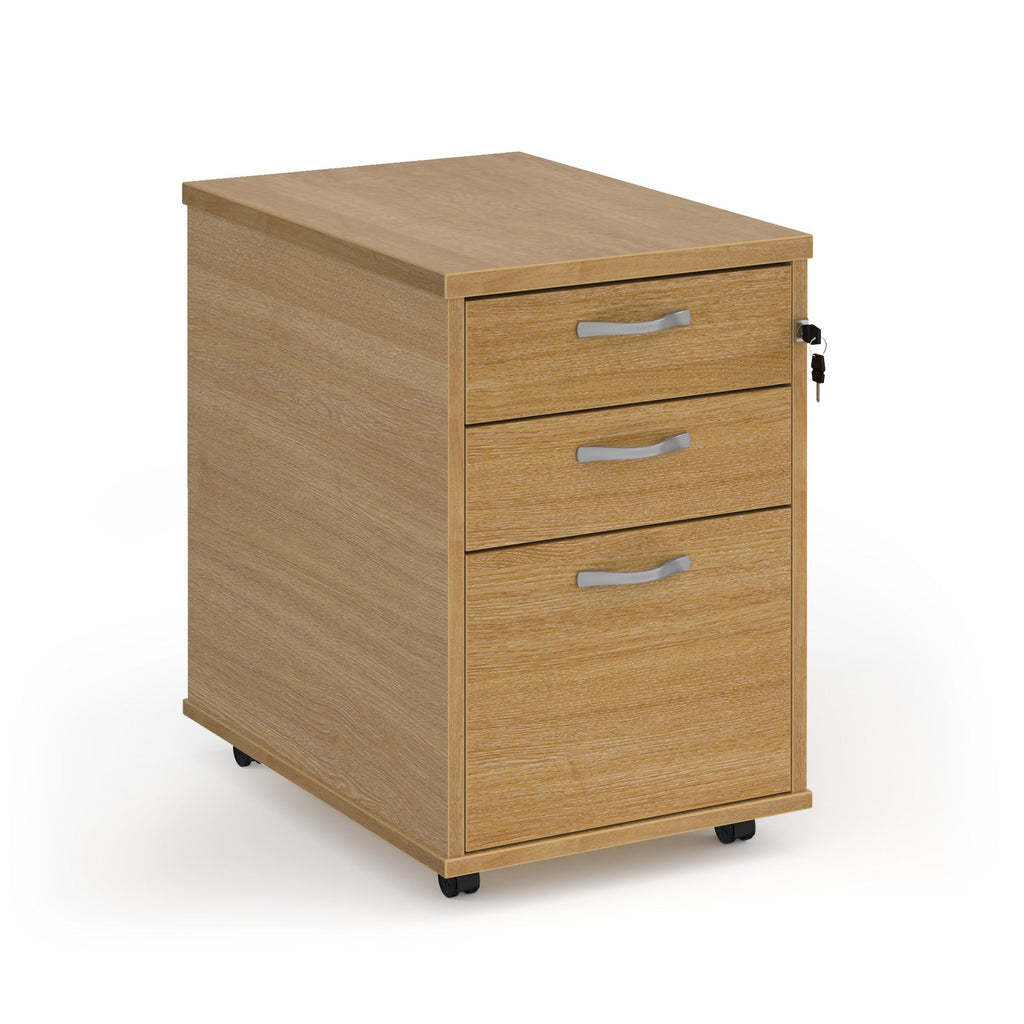 Wooden file cabinet with three drawers on a white background