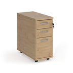 Wooden filing cabinet with three drawers on a white background