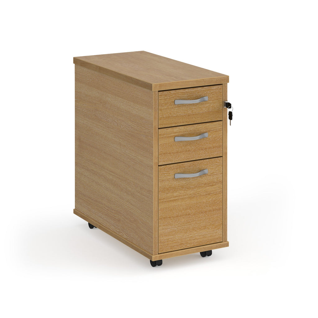 Wooden file cabinet with three drawers on a white background