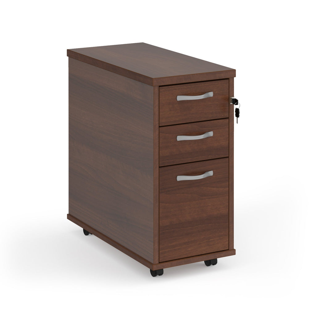 Wooden file cabinet with three drawers on a white background