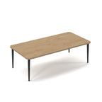 Rectangular table with slim black tapered legs, suitable for office, meeting, or breakout spaces, shown on a white background.