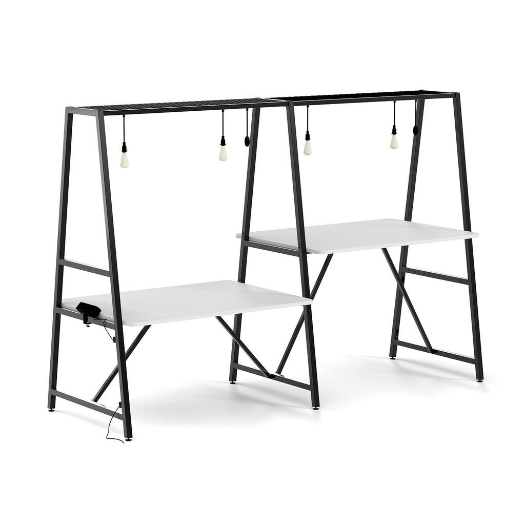 Modern double workable with accessories, black metal frame and white top on a white background 