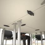 Under table with linking devices with person and chairs in the background