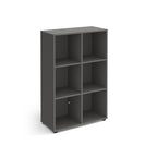 Grey office storage unit with six open cubby compartments, rectangular design, and small adjustable feet, shown on a white background.