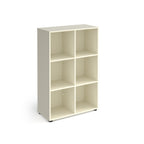 White office storage unit with six open cubby compartments, rectangular design, and small adjustable feet, shown on a white background.