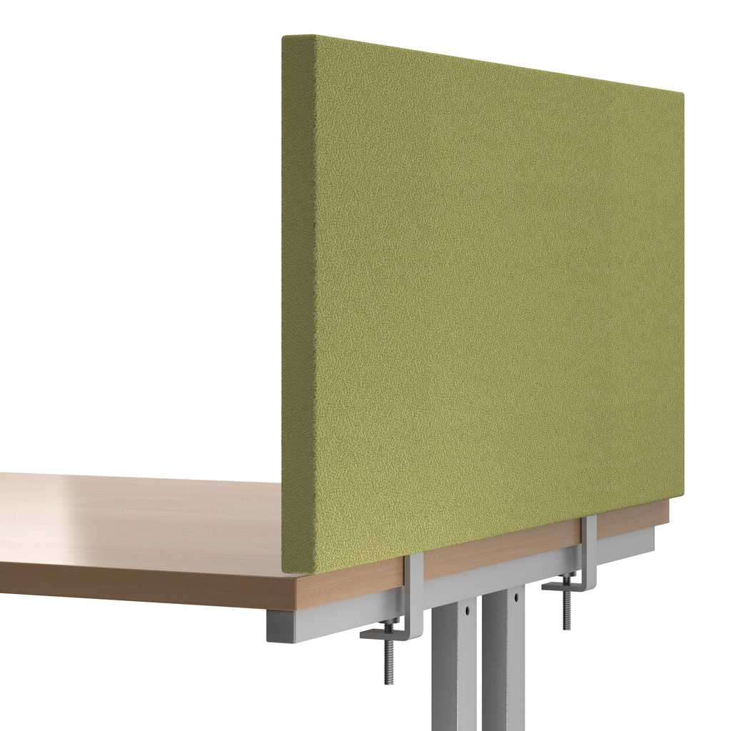 Green fabric desk divider panel clamped to a wooden office desk, providing privacy and acoustic separation in a workspace.