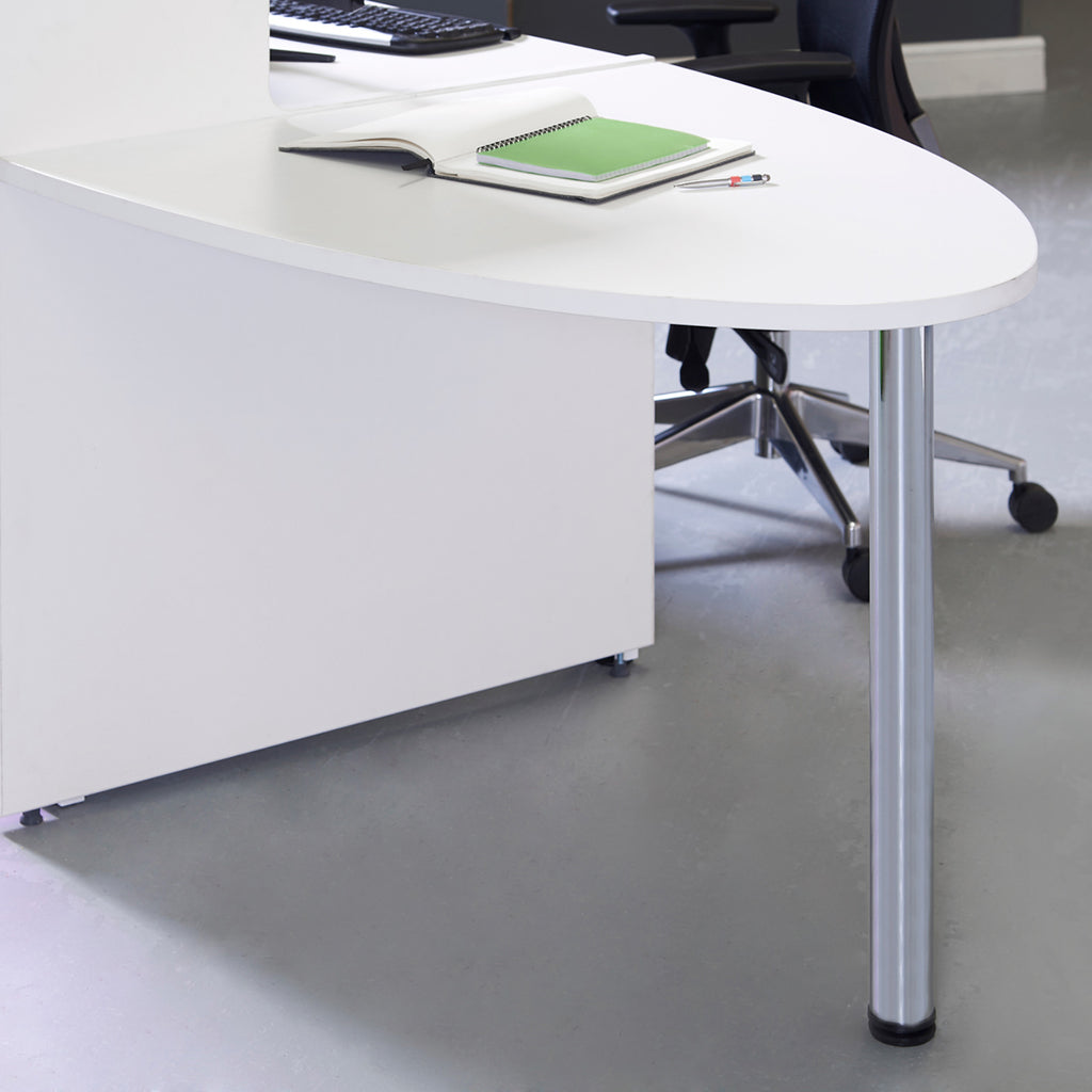 Close-up of a white reception desk with a curved countertop and chrome support leg, shown with a notebook and office chair in the background.